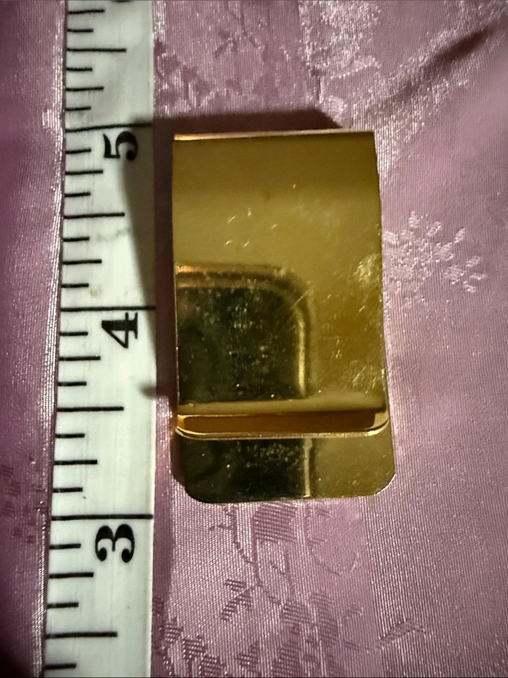 After taxes, Penny, money clip and gold tone